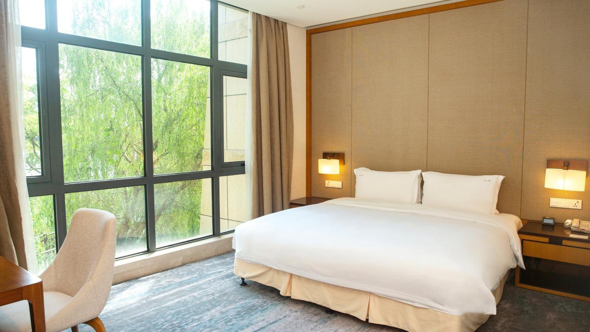 Holiday Inn Kunshan Huaqiao By Ihg Esterno foto